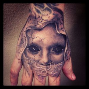 Spooky #blackeyes #photorealistic #hand tattoo
