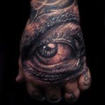 #Photorealistic #horror #eye #hand tattoo by #CarlGrace