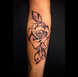 Beautiful floral design by tattoo artist Sandro Secchin, perfect for your forearm