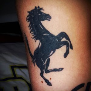 Ferrari horse tattoo