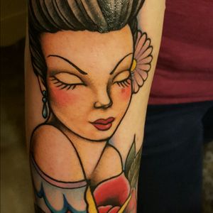 My younger sisters new pinup tattoo.
