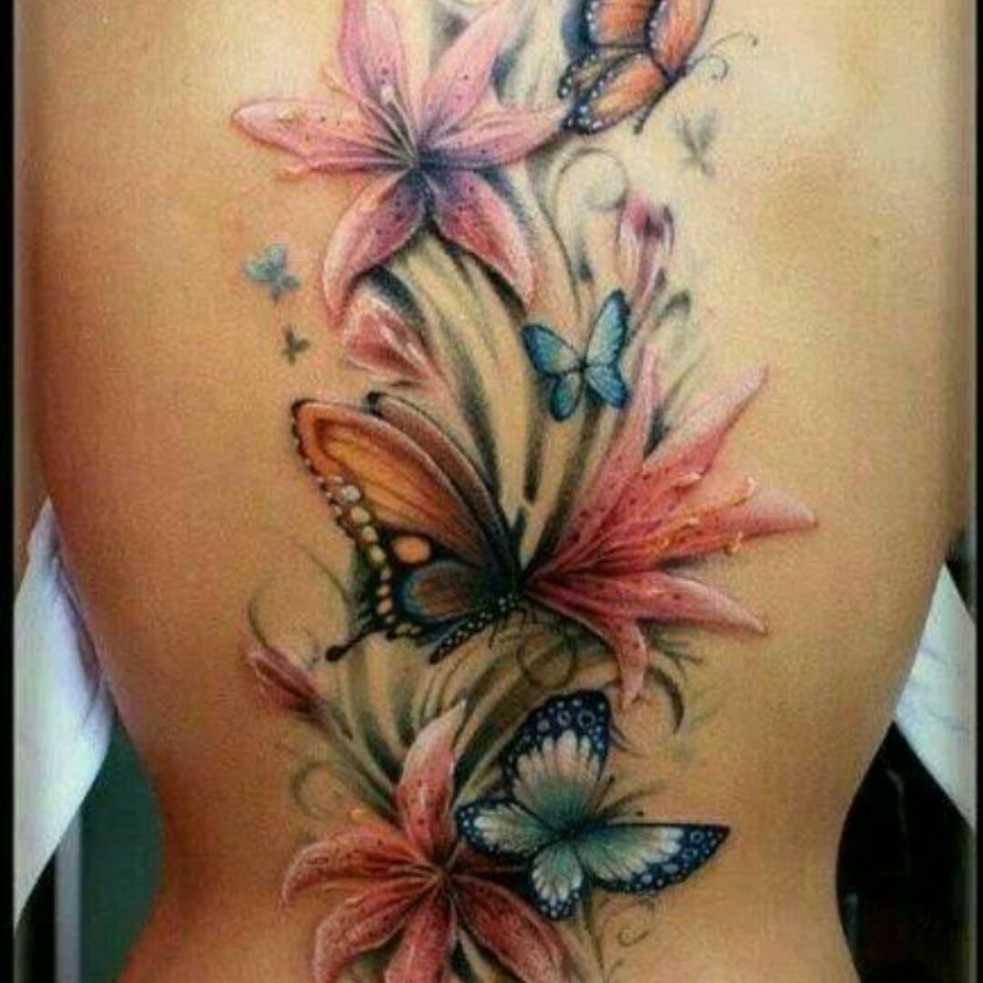60 Low Back Tattoos for women  Art and Design  Blue butterfly tattoo Butterfly  tattoo designs Lower back tattoo designs