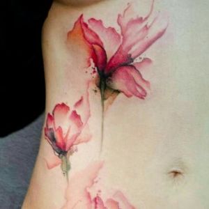 Watercolor side stomach tattoo.  Would also look great on the back up the spine with some vines and butterflies.1 #watercolor #floral #realistic # elegant #feminine