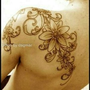 Similar to something I have envisioned for years but beginning at the nape of my neck and scrolling down my spine with color. #floral #feminine #scrollingbacktat