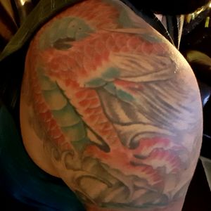 Back side of Japanese dragon, chest piece and half sleeve.