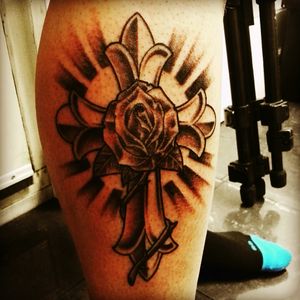 A Rose Tattoo! The cross to remember my mother that passed away last Christmas 2015. And the Rose is for my son!