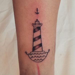 #work #tattoo #ink #lighthouse #redmonkey #redmonkeytattoo #workhard #tattooink #forearm #job #blackandwhite #sea #water #anchortattoo