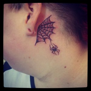 Behind the ear spider and web tattoo that i designed and tattooed