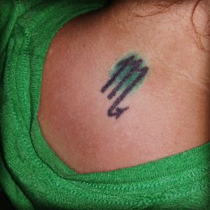 My first tattoo, on the back of my neck. This was done by an apprentice and I was the first one he tattooed besides himself and some family. No regrets. Great memory. #necktattoo #backoftheneck #scorpio