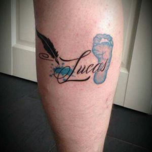 Footprint tattoo in blue