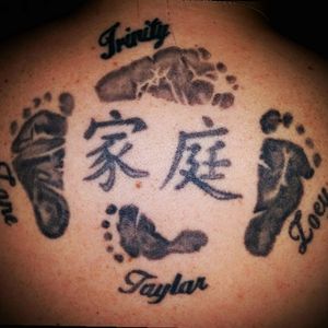Back as a whole.  The Chinese says "Forever Family"  which just so happens to be my very first tattoo. #family #tattoos #backtattoo #momswithtattoos