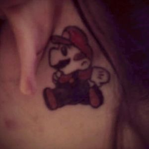 A Friday the 13th tattoo that doesn't really go withe 13th theme haha. Behind my left ear, definitely one of my favorite tattoos c: