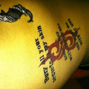 Slipknot is really part of my life and it always will be. #tattoo #ribs #slipknot #lyrics #red #black #blackandred #redandblack