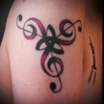 #Original design with three elements: #Celtic symbol for #family , Celtic symbol for #sister , and #trebleclef . I mixed these three designs together for my sister and I as we have #Irish in is and we love #music .