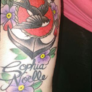 Anchor, swallow,and flowers with my daughter's name.#swallow #anchor #flowers