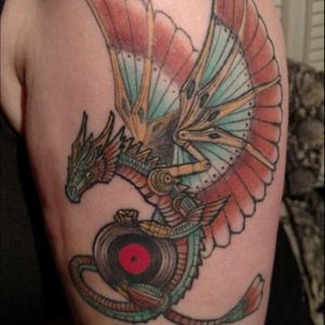 #thomasgreen did this record-hoarding #steampunk  #dragon in 2014 based on an #annestokes image my husband found This was my 50th birthday gift from my Dad, who had chickened out on treating me to my first tattoos on my 25th birthday.