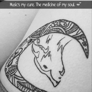 My second tattoo, done this year by a tattoo apprentice in Switzerland #wolf #moon #blackandwhite #musictattoo #music #wolftattoo #moontattoo #mandala #apprentice #switzerland #swiss