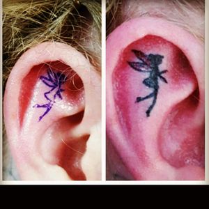 Micro fairy tattoo.