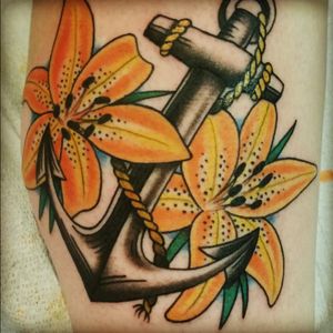 Tattoo by Bryan Davis of Tower Classic Tattooing in St. Louis #anchorwithflowers #anchor #tigerlily
