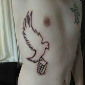 Hollywood undead dove and grenade tattoo #hollywoodundead #ribtattoo #doveandgrenade