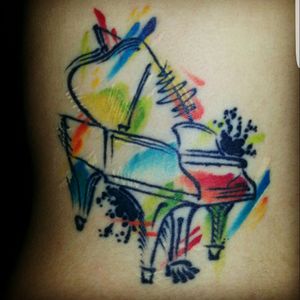 First Tattoo #watercolor #piano #pianotattoo #backtattoo