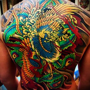 Crazy Japanese Phoenix back piece in lots of colors! #japanesetattoo #japanese #backpiece #japanesebodysuit #phoenix #colorful