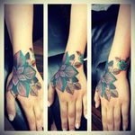 I'll do job stoppers all day long! #handtattoo #flower #flowertattoo #jobstopper #colortattoos #neotraditional