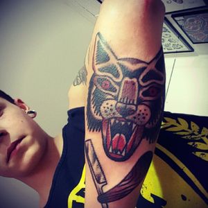 Tattoo of David Mottier #wolf #knife #oldschool #switzerland #fribourg