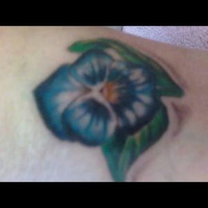 Pansy tattoo on my left outter calf.
