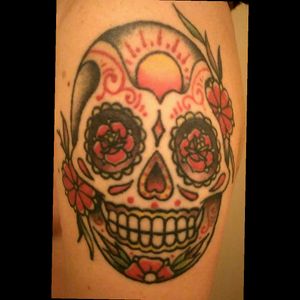 Dia de los muertos' skull done by Pandido in France.#diadelosmuertostattoo #skull #mexicandeath #mexicantattoo #mexicanskull #armtattoo #pandido #mercibonsoirtattoo #frenchie #french #diadelosmuertos #colorful