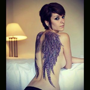 Beautiful wings.#wings #backtattoo #purple #angelwings