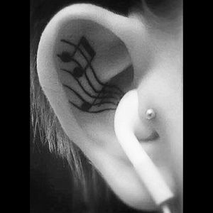 I love music, so this would be the perfect tattoo to represent that part of me #music #eartattoo #musicnotes