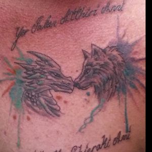My wife and I were always Game of Thrones fans. The inscription is dothrakian. My wife always said " you are my moon my Sun and stars". When she passed away I had it put on my chest over my heart.