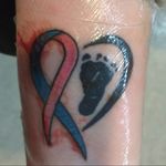 Foot print for my munchkin and ribbon for her big brother or sister in heaven they complete my heart.