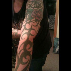 An unfinished sleeve, started over 20years ago. #tribalswirl  #englishrose #starsignsonshoulder #unfinished