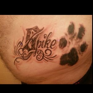 My dog that passed paw Print and name. Done by Jimmy D. At #rabbitsdentattoo in milltown nj.