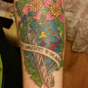 The Master Sword and Hyrule Shield from one of my Favourite Gaming Pleasures Legend of Zelda. I seen this Design on Google Images and then Got my Father In law to tattoo me at Just Ink in Blyth it on my Over a few sessions. Came out looking Awesome.