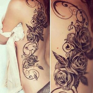 I love the femininity of this tattoo but would prefer the realism of the red rose to make it stand out! #dreamtattoo #amijamesdreamtattoo