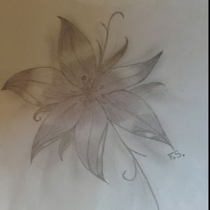This is the tattoo for my mother. She love flowers and I think she will be very happy at her birthday !