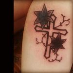 Cross with lillium flower tattoo