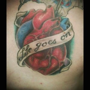 Life goes on. #chestpiece #heart #hearttattoo #color #anatomicalhearttattoo #quote