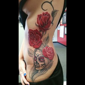 Sugar skull and roses side piece by Hank Cunningham at Artistic Skin Design and Body Piercing in Indianapolis, Indiana