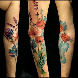 Sweet watercolour flowers & stems tattoo#dreamtattoo #mydreamtattoo