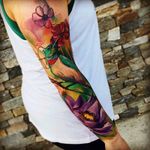 Awesome colour humming bird & flowers sleeve tattoo #dreamtattoo #mydreamtattoo