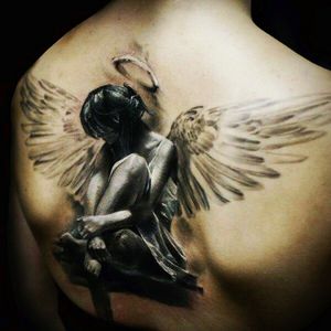Wickedly realistic angel with halo black & grey tattoo#dreamtattoo #mydreamtattoo