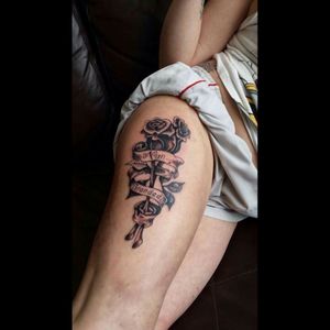 Got this on my thigh and I want to add to it so I have a full leg tattoo but not sure what to have incorporated into it