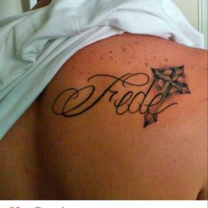 Fede.. Its Italian for faith. Some of us forget , im not excluding myself.. I got this one on my right shoulder blade to remind myself to keep the faith.
