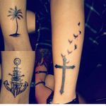 Palm is on my left ankle the pirate ship anchor is on my right ankle and the cross with the birds ascending from it is on my left forearm.