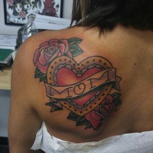 Tattoo wraps under shoulderblade a bit
