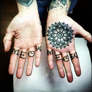 'meow' & mandela hand & fingers tattoo